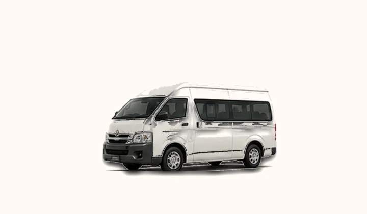 White Toyota Hiace-style passenger van